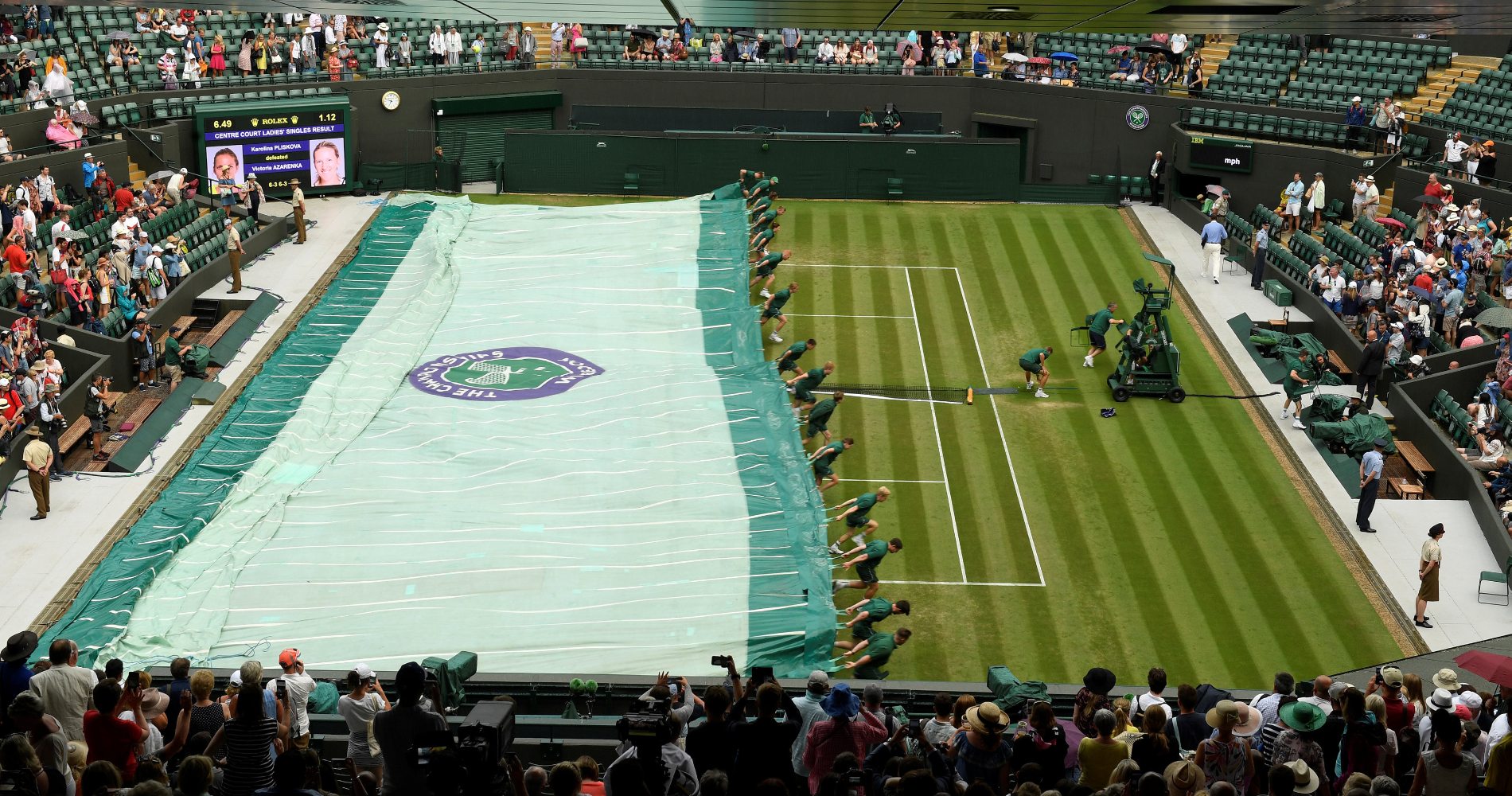Ball boys covering Wimbledon Centre court