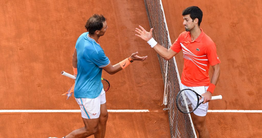 Novak Djokovic and Rafael Nadal at the net after their 54th meeting in Rome in 2019.