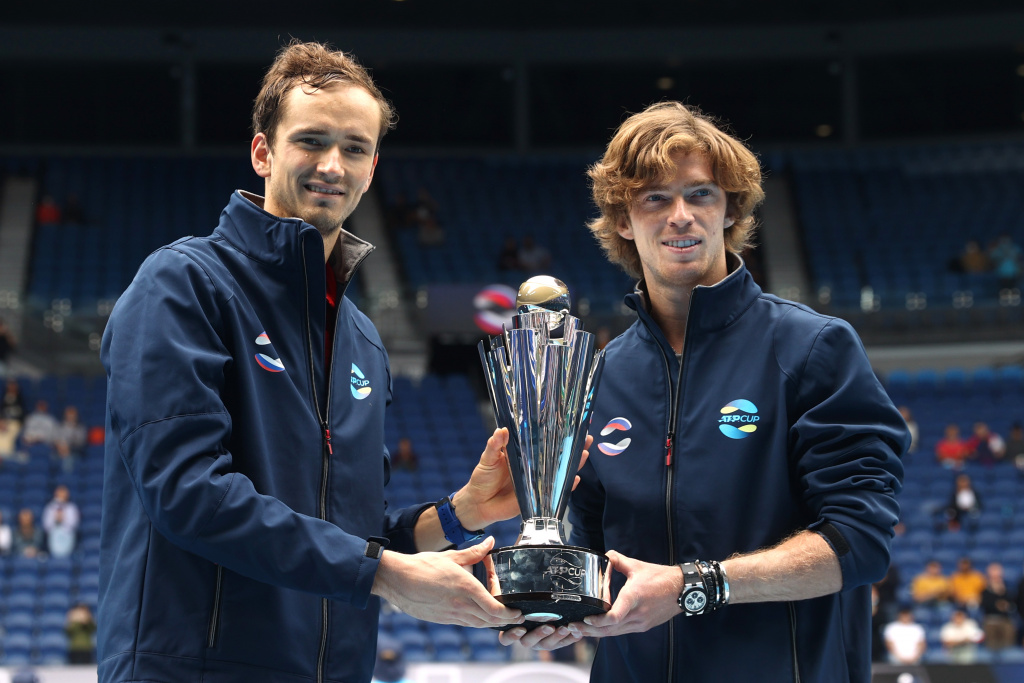 Tennis - ATP Cup - Melbourne Park, Melbourne, Australia, February 7, 2021 Russia's Daniil Medvedev and Andrey Rublev celebrate winning the ATP Cup with the trophy after their final against Italy