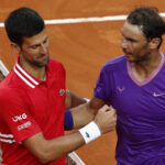 Spain's Rafael Nadal shakes hands with Serbia's Novak Djokovic