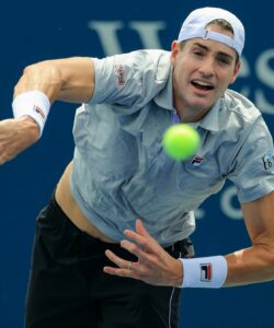 John Isner (USA) serves the ball against Cameron Norrie (GBR) during the Western and Southern Open tennis tournament at Lindner Family Tennis Center