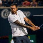Nick Kyrgios returns a ball from the United States' Reilly Opelka during National Bank Open men's tennis action, in Toronto, Monday, Aug. 9, 2021.