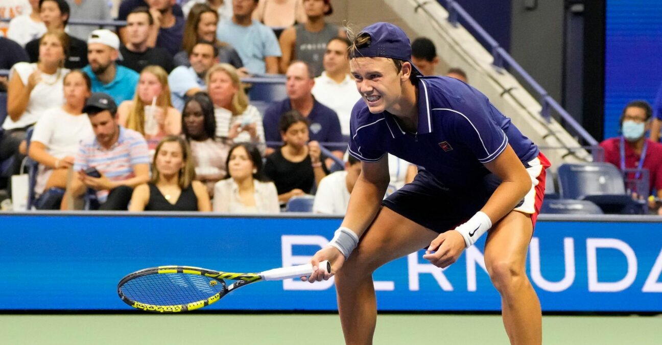 Holger Rune suffers from cramps while playing Novak Djokovic on Day 2 of the 2021 U.S. Open