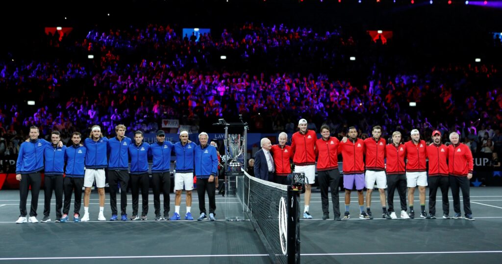 Rod Laver lines up for a photo alongside Team World players and captain John McEnroe and the Team Europe players and captain Bjorn Borg before the start of play at the 2019 Laver Cup
