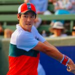 Soonwoo Kwon (KOR) hits a backhand to Milos Raonic (CAN) at the AgBioEn Kooyong Classic on Day 1 in Melbourne Australia