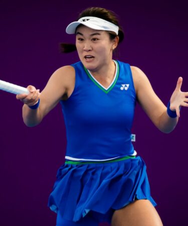 Lin Zhu of China in action during the second qualifications round of the 2021 Qatar Total Open WTA 500 tournament