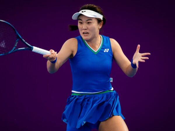Lin Zhu of China in action during the second qualifications round of the 2021 Qatar Total Open WTA 500 tournament