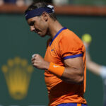Rafael Nadal, of Spain, reacts after a shot to Sebastian Korda at the BNP Paribas Open tennis tournament Saturday, March 12, 2022, in Indian Wells,