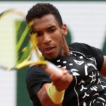 Canada's Felix Auger-Aliassime in action during his first round match against Peru's Juan Pablo Varillas