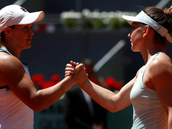 Romania's Simona Halep and Australia's Ashleigh Barty shake hands after their quarter final match at the Madrid Open 2019