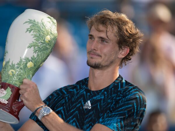 Alexander Zverev poses with the trophy after winning the Western and Southern Open final in Cincinnati
