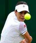 Australia's Ajla Tomljanovic in action during her fourth round match against France's Alize Cornet at Wimbledon 2022