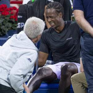 Gael Monfils gets medical attention during the 2022 National Bank Open in Montreal