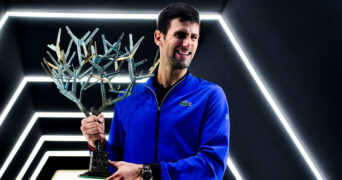 Novak Djokovic with the winner's trophy at the Paris Masters